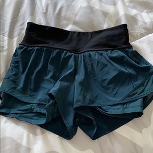 Teal and black lululemon shorts size 4